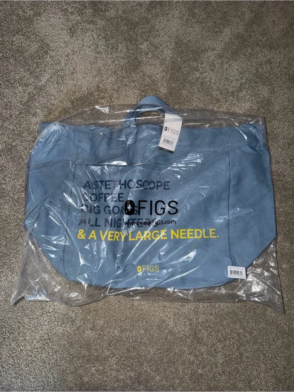 Figs Light Blue Duffel Bag with Yellow Logo Text